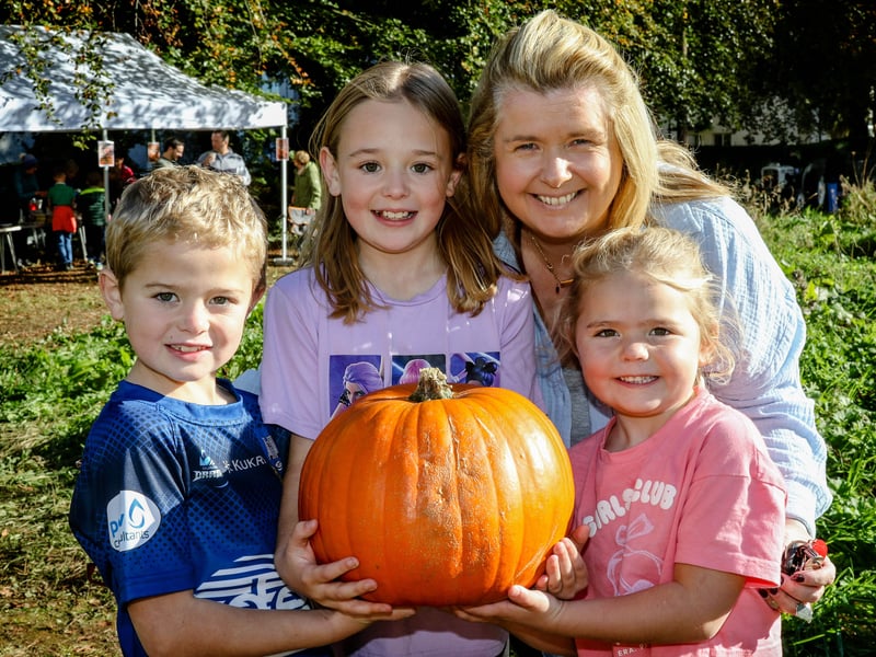 Ruth Archer, along with her grandchildren Brody, Mya and Karlie, who picked a huge pumpkin at the recent Pick and Pumpkin event raising money for Drumglass Parish Church.