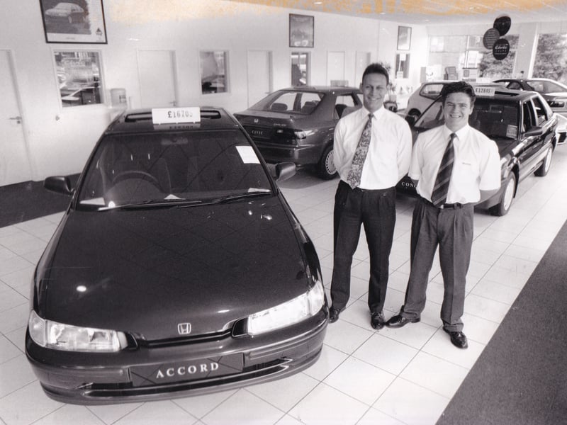 At your service. Andrew Lloyd, left, sales manager, and Chris Gillott, sales executive, at Leeds South Honda in July 1994.