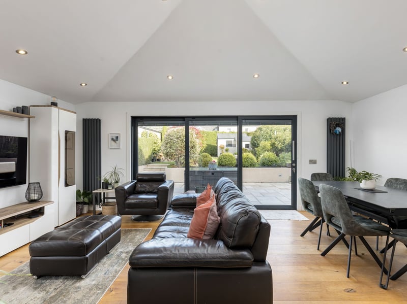 Undoubtedly the heart of the home is the superb extended kitchen, living and dining room to the rear. Flooded with natural light from sliding patio doors opening directly onto the garden and skylights, this versatile space is ideal for both everyday family life and entertaining.