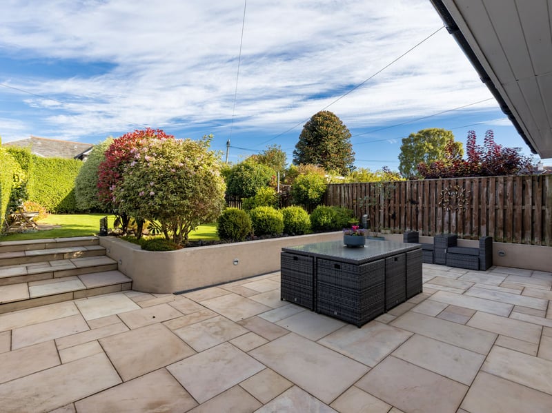 Externally, the beautifully landscaped rear garden provides a wonderful outdoor retreat. A large patio area offers the perfect setting for summer dining and entertaining, while the remainder of the garden is laid to lawn and bordered by mature planting. Two garden sheds provide useful additional storage.