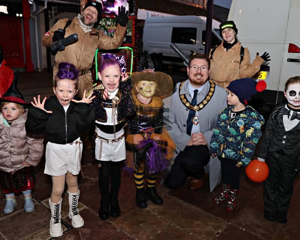 Deputy Mayor Richard Stewart with some of the Scary Ones to be judged the scariest at the Ballymoney Halloween last year.    WK44-25KC80BM