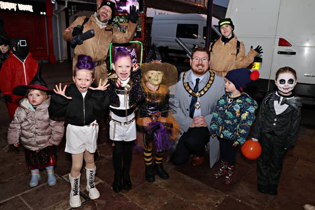 Deputy Mayor Richard Stewart with some of the Scary Ones to be judged the scariest at the Ballymoney Halloween last year. WK44-25KC80BM