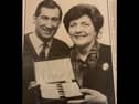 William and Linda Anderson display the set of cutlery given to them by the Queen Mother.