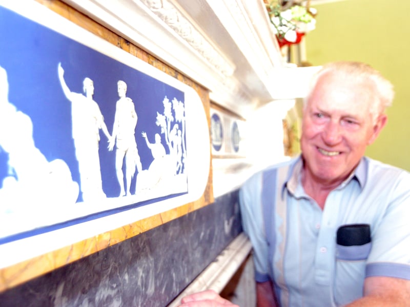 Roger Dawes, of Bawtry, admires an original Wedgewood fireplace, as he visits Bawtry Hall on a Heritage open day .