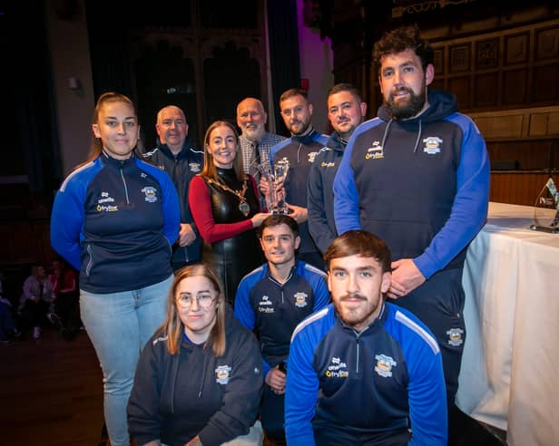 Representatives from Strabane Athletic FC, winners of the Club of the Year Award, receiving their trophy from the Mayor, Grace Ui Niallais, at the annual Derry City and Strabane District Sports Awards 2026 in the Guildhall. Also pictured back centre is Bill Anderson, chair, Sports Council. (Pic: Jim McCafferty Photography).