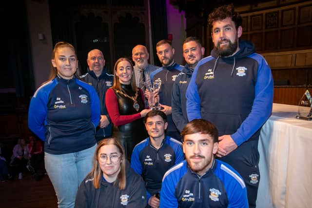 Representatives from Strabane Athletic FC, winners of the Club of the Year Award, receiving their trophy from the Mayor, Grace Ui Niallais, at the annual Derry City and Strabane District Sports Awards 2026 in the Guildhall. Also pictured back centre is Bill Anderson, chair, Sports Council. (Pic: Jim McCafferty Photography).