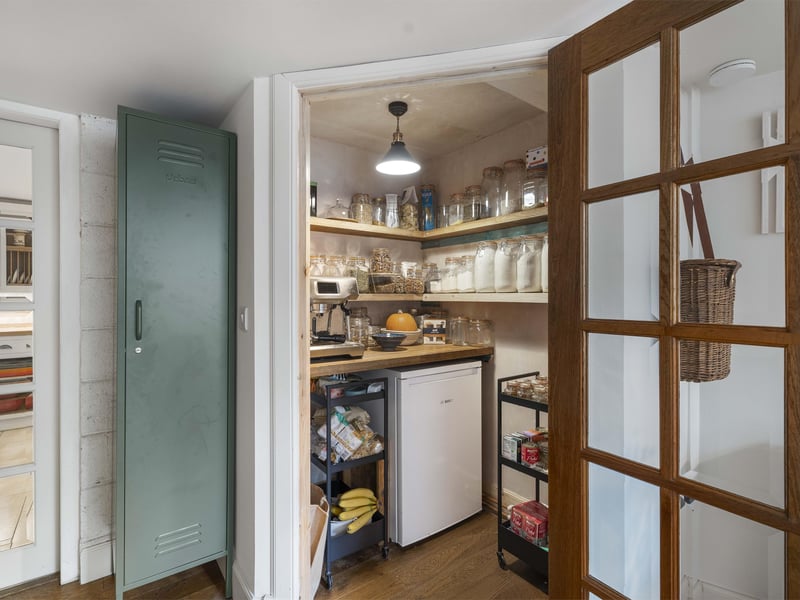 This handy pantry cupboard adds valuable storage space inside this East Lothian cottage. 