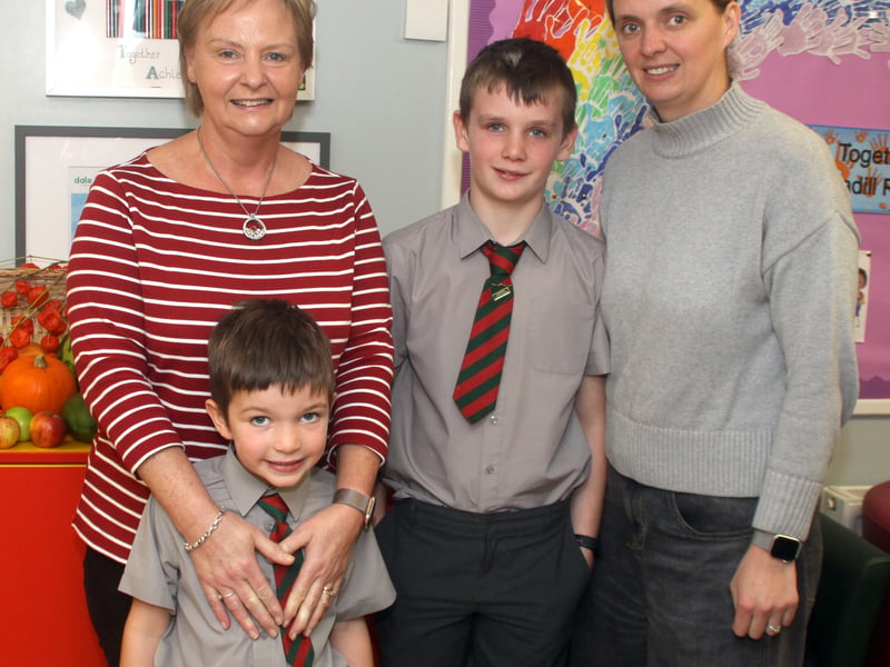Pupils, Jack and Tom McMahon with their mum, Diane and Granny Carolyn McKinstry.