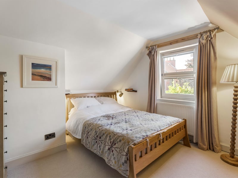 Upstairs, there are two good-sized double bedrooms and an additional storage cupboard on the landing.