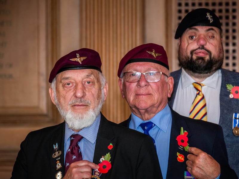 Veterans Neil Munro, Paul Bradford and Simon Brown, wearing their poppies