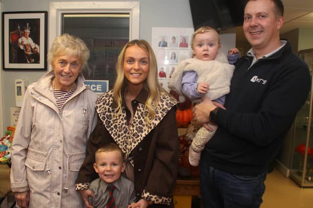 Lisnadill Primary School pupil, Reuben Silvey with his parents, Naomi and Kyle, sister and Auntie Carol at Harvest.