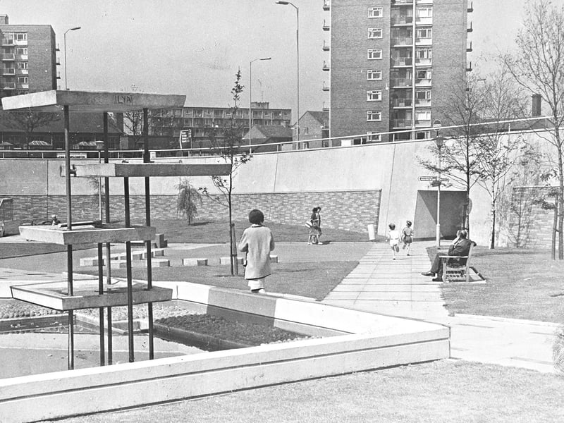 Pedestrians stroll through the newly created sunken garden and subways at the centre of the Penn Road roundabout junction on the Wolverhampton Ring Road in July 1966. The modern urban layout sparked debate among locals, with critics questioning whether the public space was being fully utilised after observations showed only dozens of passers-by pausing briefly in the garden each day. Plans were already being considered by Wolverhampton Corporation to build a similar sunken garden at the junction of Darlington Street and Chapel Ash. Do you remember walking through these ring road subways or taking a seat in the sunken gardens during the 1960s?