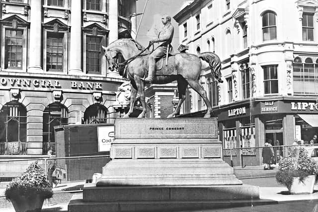 The famous equestrian statue of the Prince Consort, Prince Albert, stands proudly in Queen Square, Wolverhampton, in this photograph from September 1966. By the 1960s, the iconic landmark had weathered numerous local debates, with town planners and residents putting forward proposals ranging from relocating the bronze monument to West Park to even replacing it with a statue of the Duke of Edinburgh in polo kit. Do you remember meeting friends by "The Man on the Horse" in Queen Square back in the 1960s?