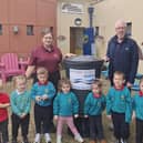 Pupils from Rainbow Community Playgroup, Omagh with their new NI Water waterbutt. SU3744CD26