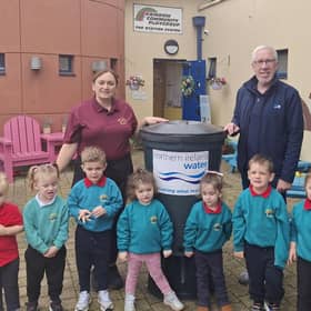 Pupils from Rainbow Community Playgroup, Omagh with their new NI Water waterbutt. SU3744CD26