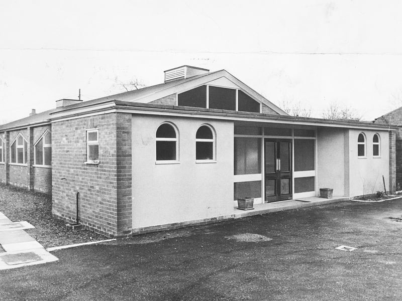 The newly constructed National Spiritualist Church stands ready for its congregation on Waterloo Road, Wolverhampton, captured on March 25, 1966. The modern single-storey building with its distinctive brick trim and arched window features was scheduled for its official opening shortly after on April 9, 1966. Do you remember when this new church building opened its doors on Waterloo Road in the spring of 1966?