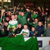 Shamrocks captain Aodhan Furlong holding the cup, surrounded by fans. Picture: Brendan Monaghan.
