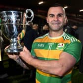 Edendork captain, Conor Mallon, celebrates with the O’Neill Cup after the Tyrone Senior Football Championship  final replay.