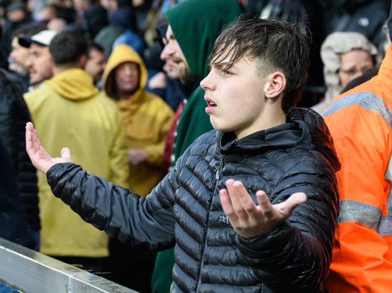 Burnley fans inside Sincil Bank for the Championship fixture against Lincoln City. Photo: Kelvin Lister-Stuttard