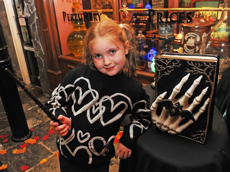 Evie Ellis, six of Leeds casts a spell at Abbey House Museum 