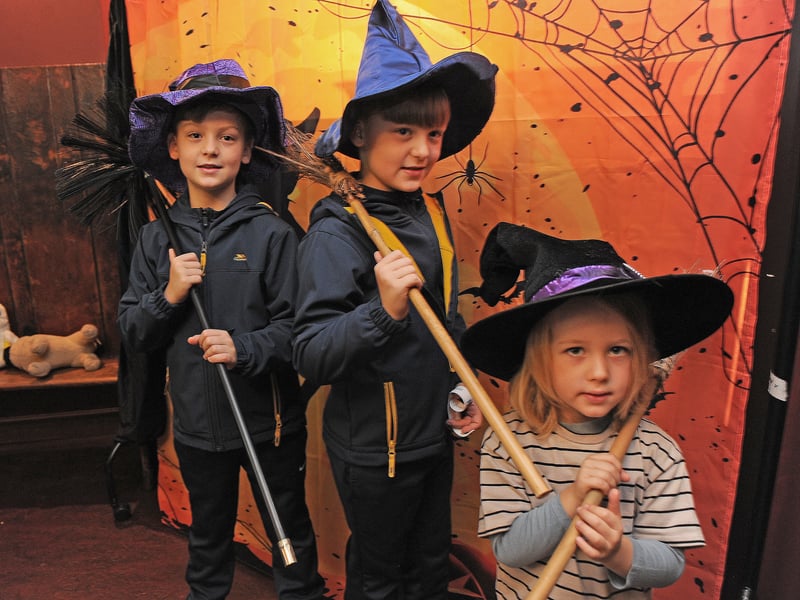 Twins Jenson and Quinton Mardy, eight, of Leeds and cousin Caleb Day-Ford, three, enjoy dressing up in the photo studio 