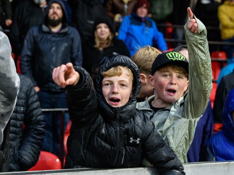 Burnley fans inside Sincil Bank for the Championship fixture against Lincoln City. Photo: Kelvin Lister-Stuttard