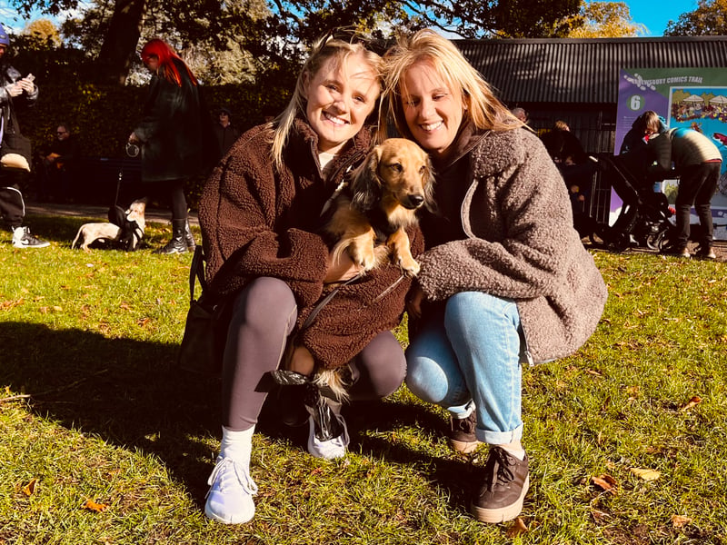 Lauren and Lisa Neal, from Shrewsbury, give Otis a cuddle