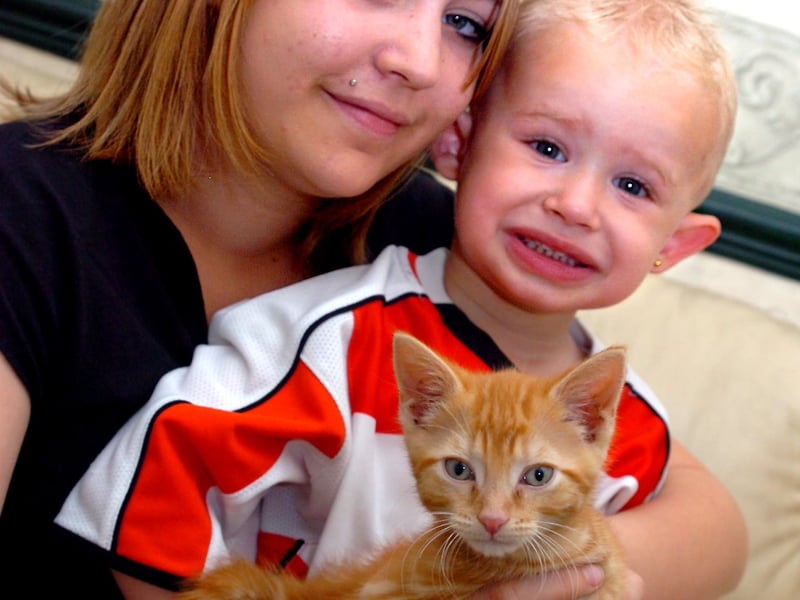 19/6/2007.

Jonah Johnson, aged two, his sister Shaney Stenton, aged 15, and Frisby the cat, aged seven weeks.


