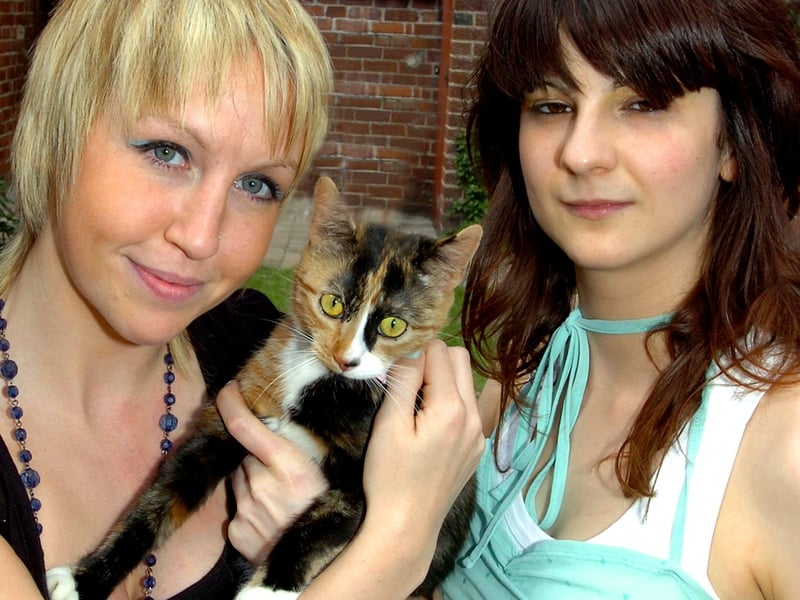 22 May 2007. 

Natalie Woodhouse (left) and Emma Lord, both aged 25, of Hyde Park, whose house suffered a burglary, but neighbours kept the thief inside the house while the Police arrived. The thief smashed this rear window and attempted to steal Natalie's purse, among other items. Natalie's cat, Audrey, hid while the thief was in the house.
