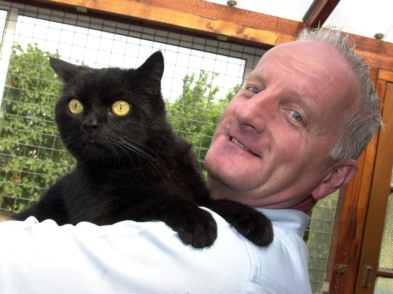  23/6/2003.

Charlie the cat is reunited with its owner Martin Limb. The cat was found by voluntary cat carer Marilyn Haselhurst who identified the owner from its microchip.


