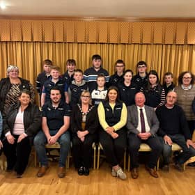 The council chair of Fermanagh and Omagh District Council with councillors and members of Clanabogan Young Farmers' Club.
