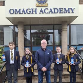 Omagh Academy pupils with their new reusable water bottles as part of NI Water’s Refillution campaign. SU4344CD26