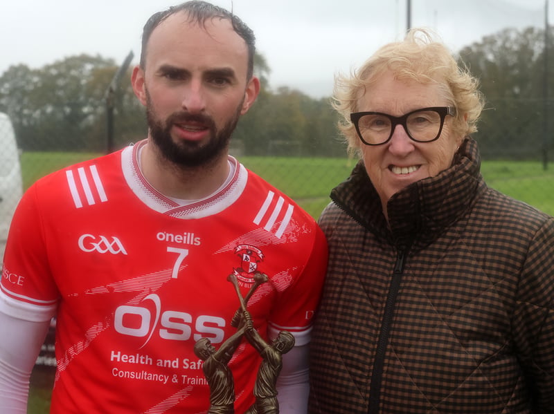 Mary Fitzgerald of the Woodlands House Hotel and Spa presents Doon's Patrick Cummins with Man of the Match award