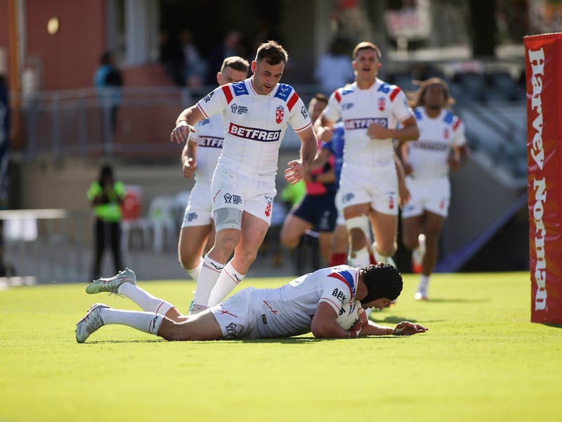 Harry Smith celebrates Victor Radley's try against France