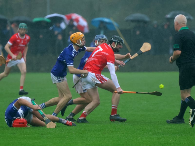 Doon's Patrick Cummins looking to earn possession during their game with Caherline in Cappamore