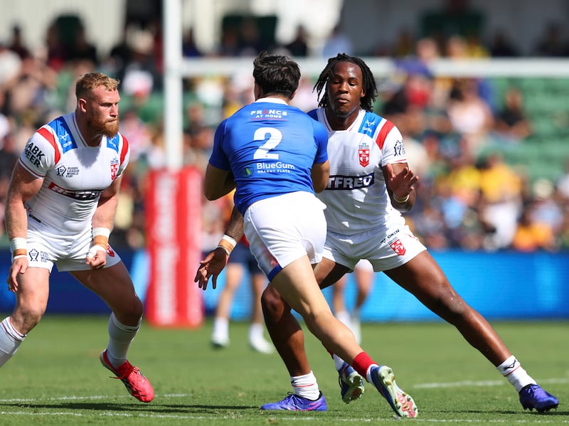 Luke Thompson (left) and Junior Nsemba (right) putting in the graft against France