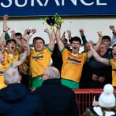 Desertmartin’s players celebrate their victory against Greenlough in the McFeely Group Derry Club Intermediate Championship final held in Celtic Park, on Sunday.
