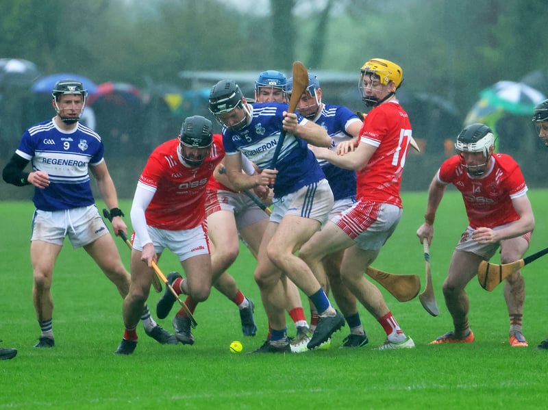 Daniel Murnane, Caherline and Patrick Cummins, Doon looking to win possession