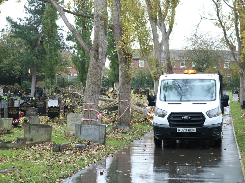 One tree collapsed and causing damage to several of the graves
