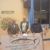 At the gathering to celebrate 35 years of Ardstraw Community Angling Club were, from left,  guest speaker Dr Liam Campbell, club chairman, Colin Duncan and club committee member, Rodney Noble. SU5144CD26