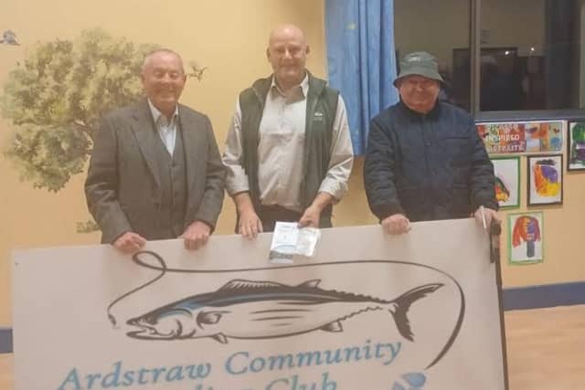At the gathering to celebrate 35 years of Ardstraw Community Angling Club were, from left, guest speaker Dr Liam Campbell, club chairman, Colin Duncan and club committee member, Rodney Noble. SU5144CD26