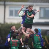 Tommi Coulter takes the line-out.