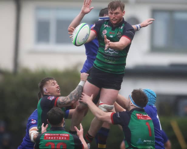 Tommi Coulter takes the line-out.