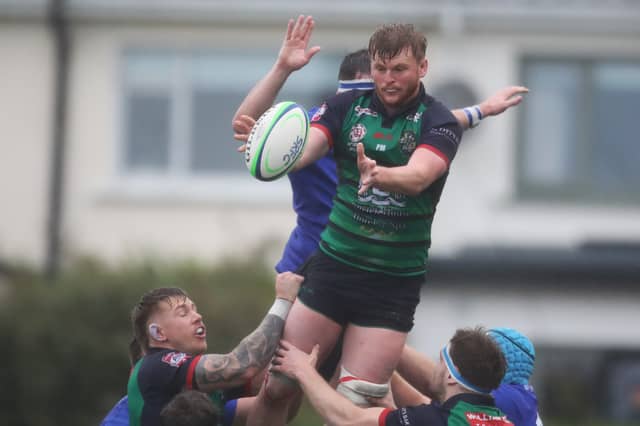 Tommi Coulter takes the line-out.