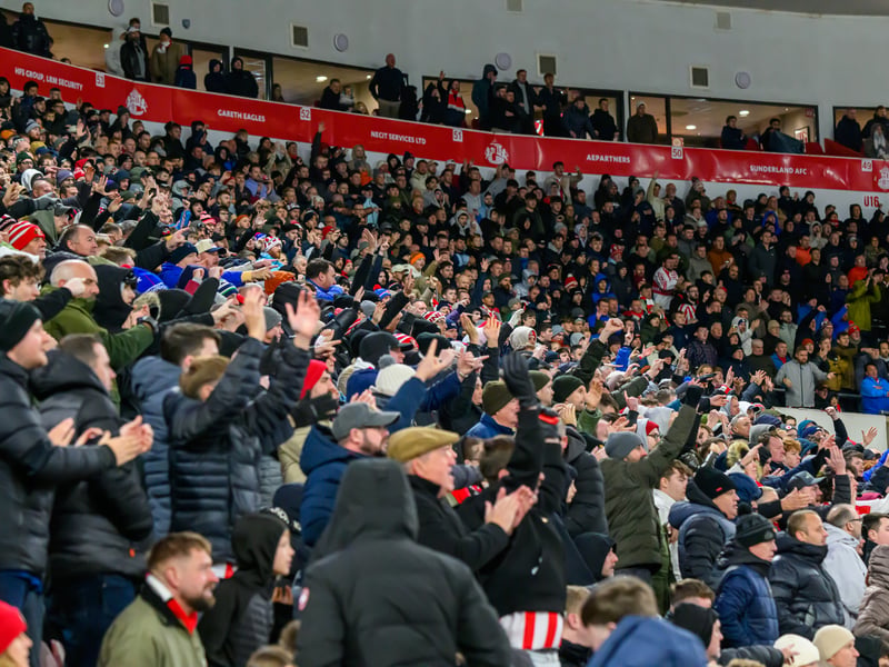 Sunderland fans in action at the Stadium of Light during the Premier League game against Leeds United. Photo by Chris Fryatt.
