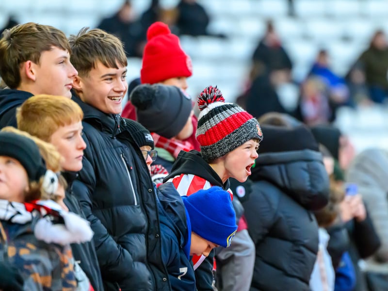 Sunderland fans in action at the Stadium of Light during the Premier League game against Leeds United. Photo by Chris Fryatt.