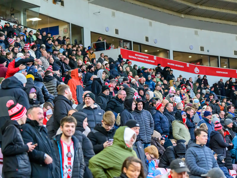 Sunderland fans in action at the Stadium of Light during the Premier League game against Leeds United. Photo by Chris Fryatt.