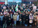 SOME of the ladies who work in Daisy Hill Maternity Ward pictured at the front of the rally in Marcus Square on Sunday. NM264367