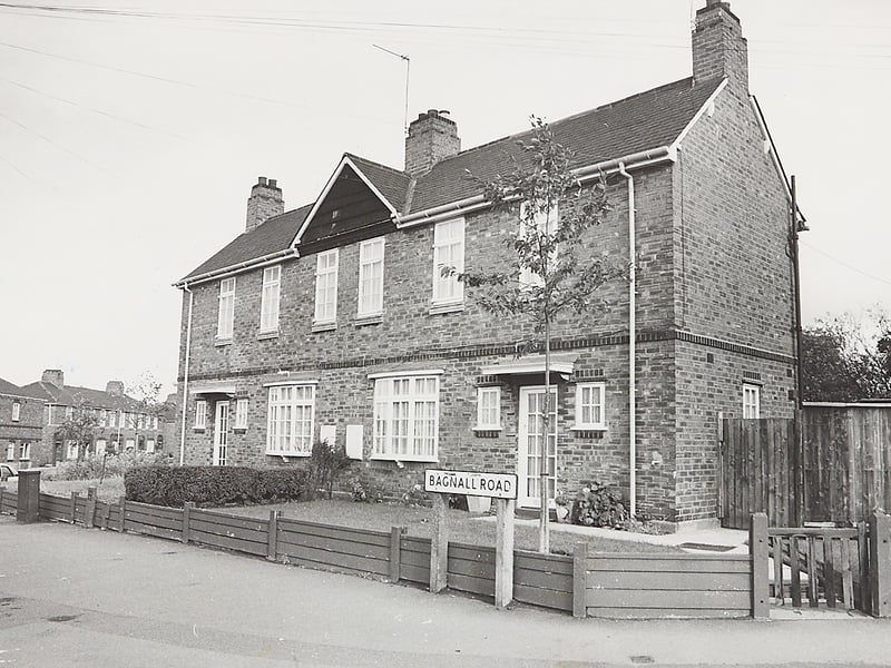 Neat brick semi-detached council houses stand along Bagnall Road, Wolverhampton, in November 1982, illustrating the local impact of national policy shifts. Intended modernisation programmes designed to upgrade the town's pre-war council properties were brought to a sudden halt following sweeping government spending cuts to municipal housing budgets. Do you remember living along Bagnall Road or waiting for council modernisation works during the cutbacks of the early 1980s?