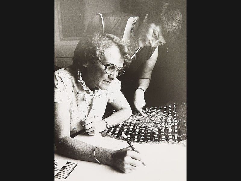Senior area organiser Dilys Lewis guides student Kathleen Taylor through the intricate pattern of a Victorian tapestry seat cover at Compton Grange Adult Education Centre, Compton Road West, Wolverhampton, in August 1982. Requiring an astounding 27,300 individual stitches and estimated to take a full year to complete, the painstaking needlework was part of a popular two-week summer school programme attended by more than 200 local residents exploring crafts from sculpture to embroidery. Did you attend summer craft workshops or learn needlepoint at Compton Grange during the 1980s?